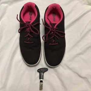 Black and pink women’s HEELYS